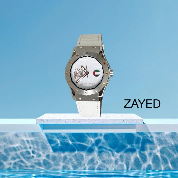 Watch with a visible brand name on a blue background