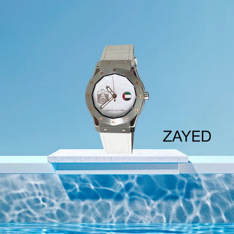Watch with a visible brand name on a blue background