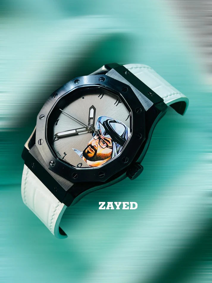 Watch with a unique face design on the dial against a teal background, featuring the brand 'Zayed'.